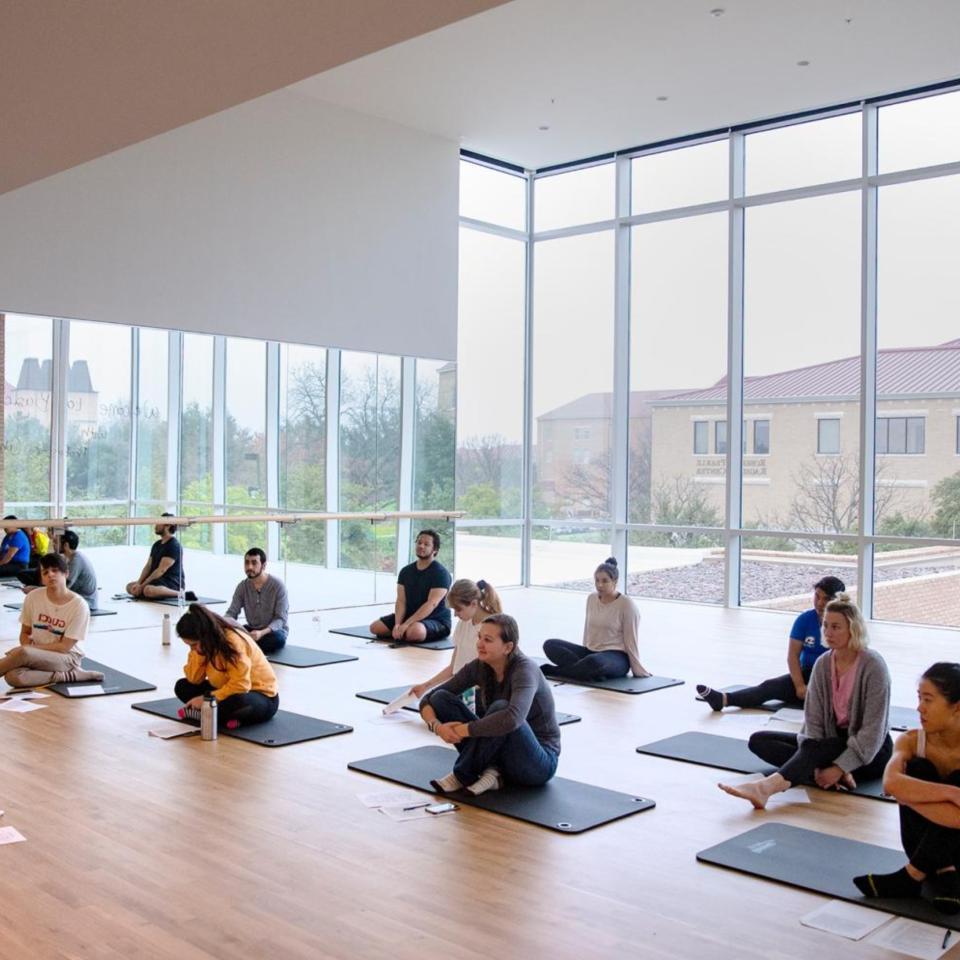 A yoga class taking place on St. Edwards Campus